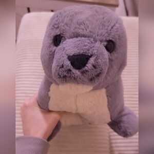 Seal stuffed animal with removable heating pack--like new